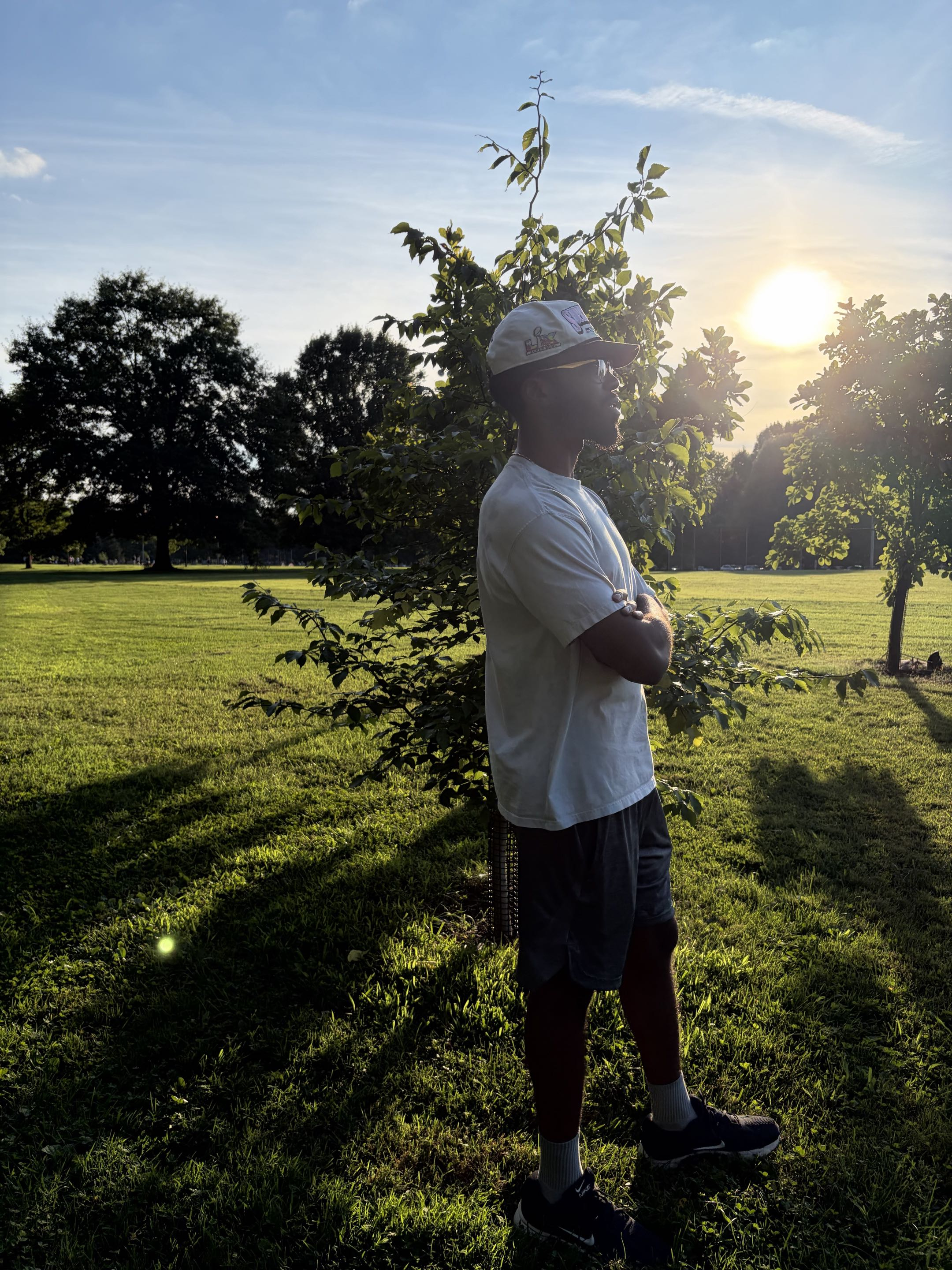 Nigel Benton standing outdoors at sunset